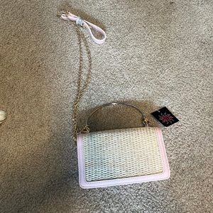 Small pink and straw purse